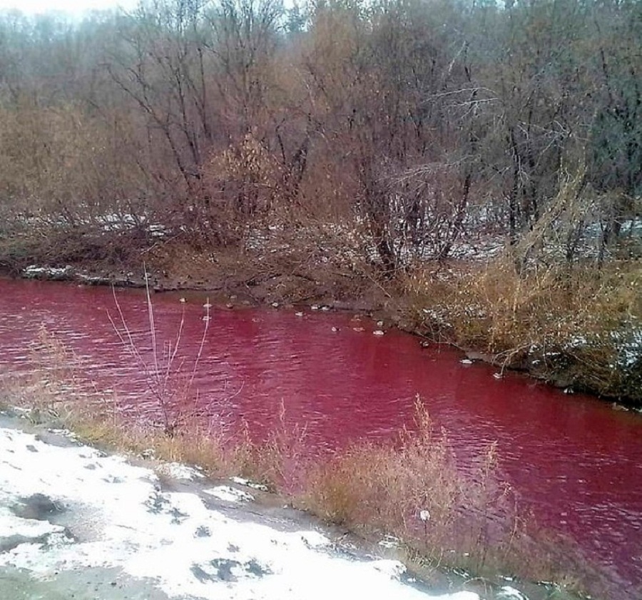Red water in river